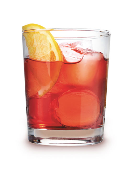 Cocktail Canadian passion orange servi dans un verre tumbler